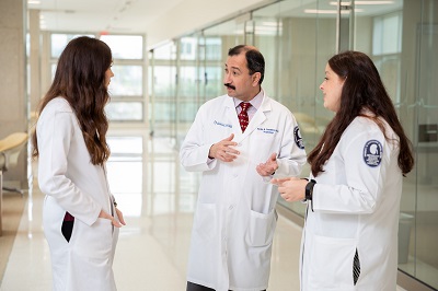 Fellows and providers discuss a case.